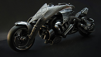 Коллекционная модель мотоцикла из серебра.